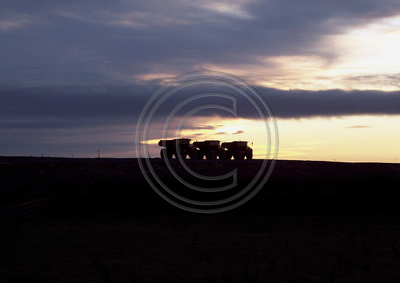 Three trucks on a Mountain